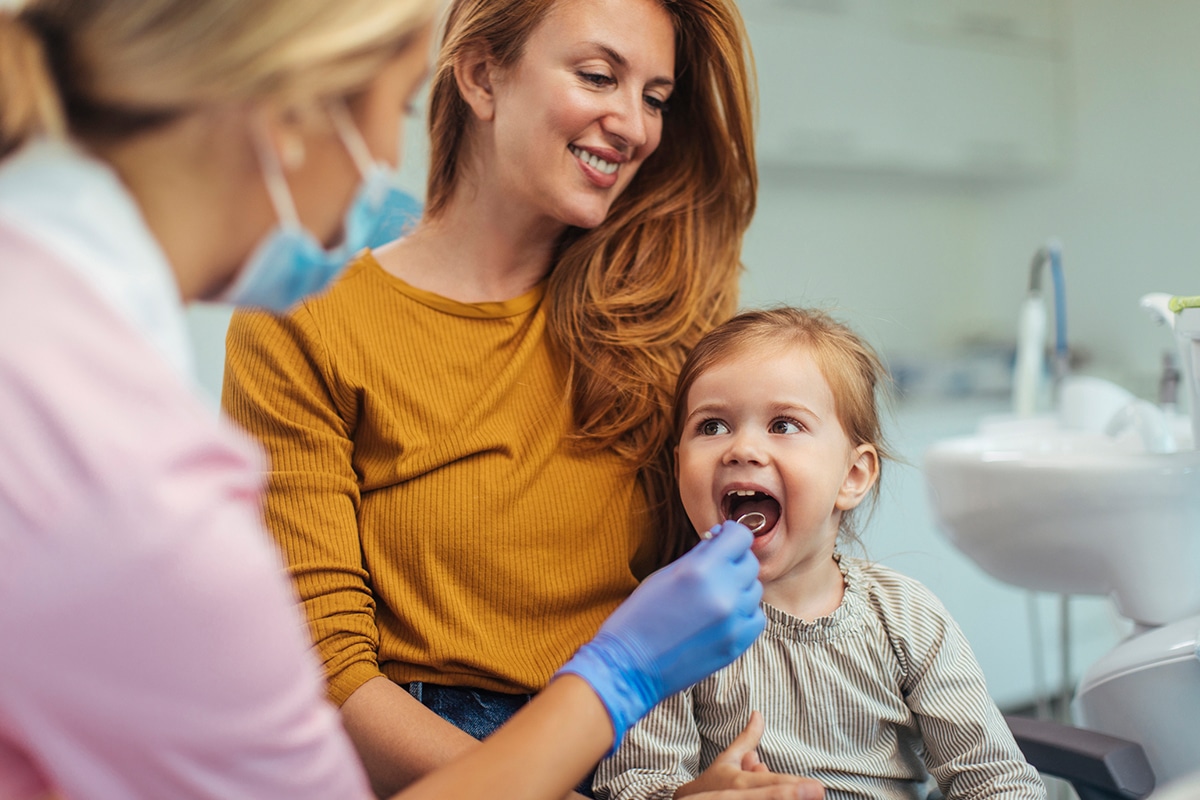 What happens at your childs first dental visit a parents guide blog